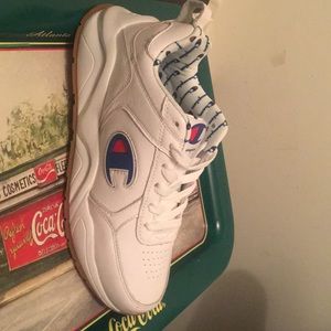 Never worn champion shoes size 6youth